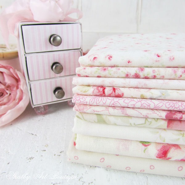 Pretty stack of pink floral fabrics for faux patchwork project by Shabby Art Boutique